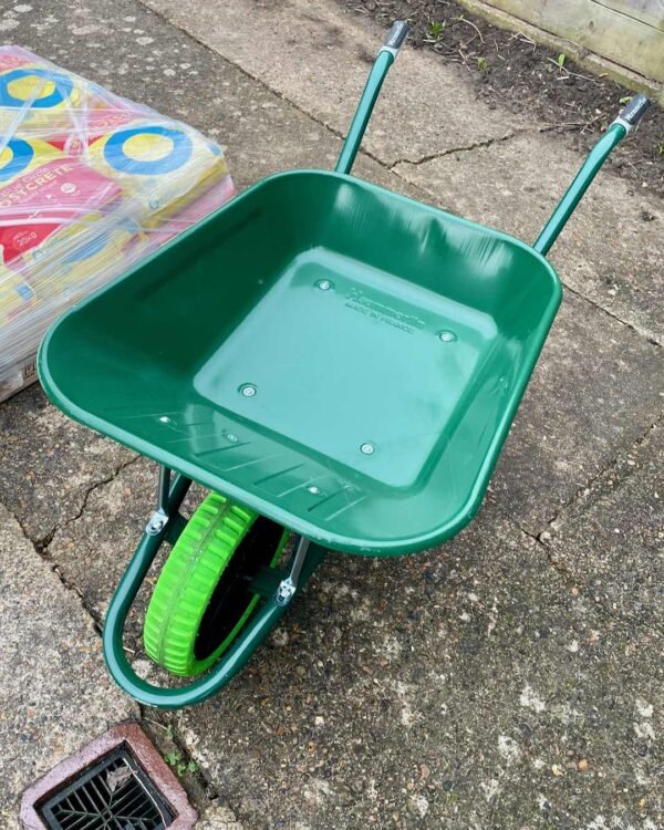 Green Haemmerlin 90L trade wheelbarrow with puncture proof tire